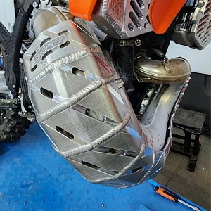 Защита картера и резонатора Husqvarna 24г.